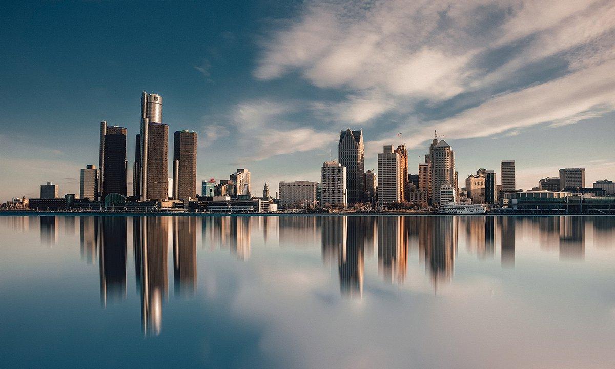 City skyline reflected in water
